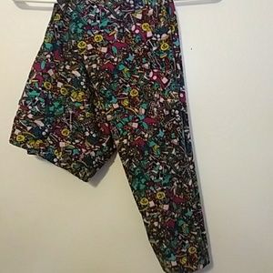 OS leggings with toys on them